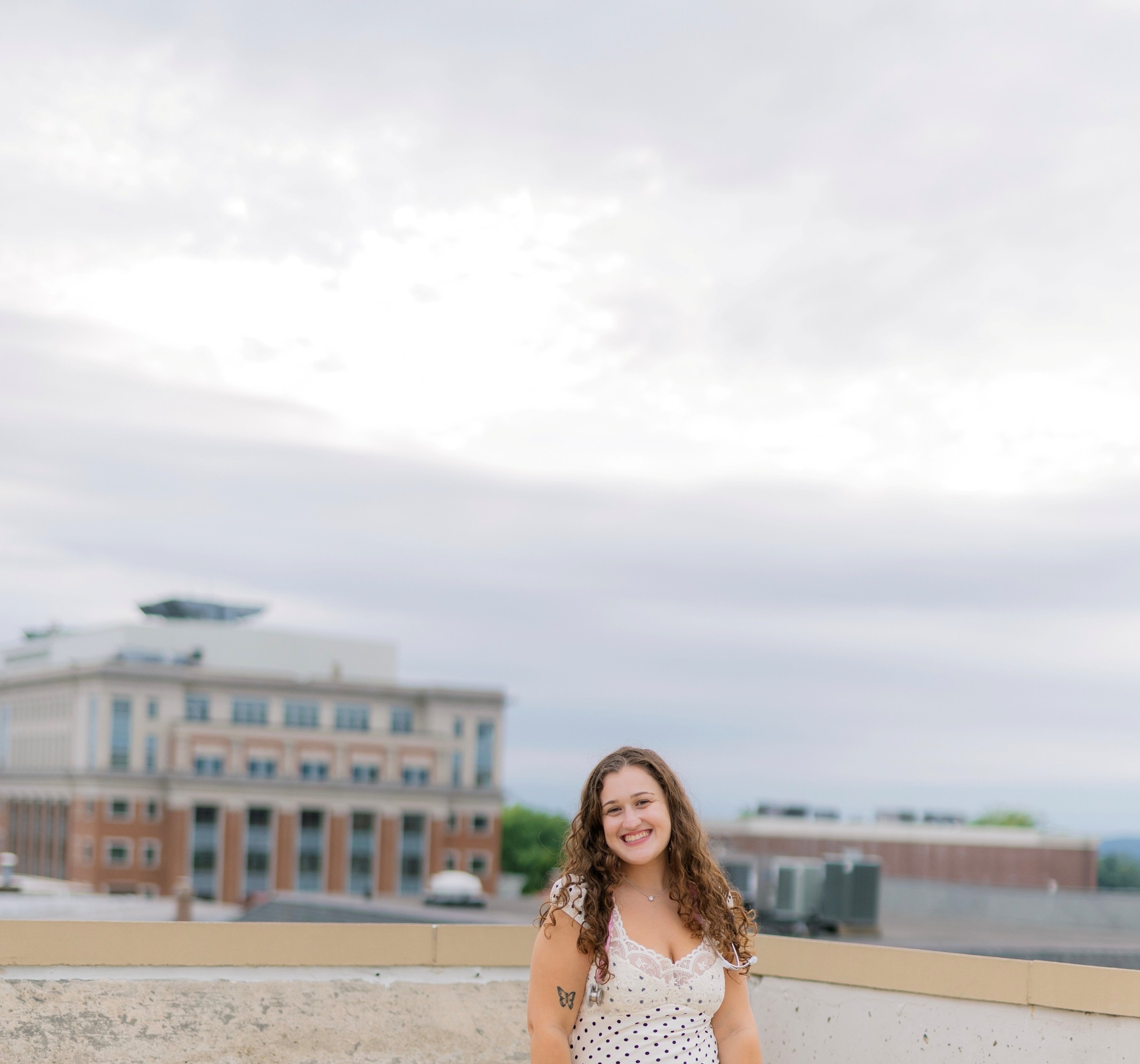 Victoria smiling outdoors